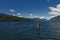 Austrian Lake of Millstat with Alps and puffy Clouds