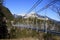 Austrian suspension footbridge Highline179 against a blue sky.