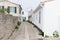 Authentic cobblestone and white house street in Saint Martin de Re France