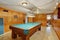 Authentic game room with pool table.