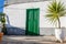 Authentic green front door of a house in La Caletta. Tenerife, Canary Islands, Spain