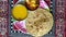 Authentic Gujrati lunch dish with mango juice and roti with potato vegetables, India.