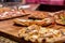 Authentic Italian pizza in a restaurant display window in Rome