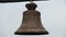 Authentic medieval church bell covered with rust, ancient symbol of eternity