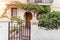 Authentic old house with wooden door and window and garden