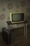 Authentic retro Soviet portable analog TV and attache case, vertical image