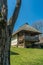 Authentic Romanian village house covered with straws and built with natural bio materials in traditional architecture