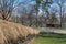 Authentic Romanian village house covered with straws and built with natural bio materials in traditional architecture