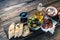 Authentic spanish tapas on wooden board, tonned picture