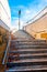 Authentic urban staircase in underground passage with exit to traffic lights in England