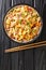 Authentic Yangzhou Fried Rice Chao Fan close up in the plate. Vertical top view