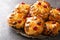Authentic Yorkshire Fat Rascals scones with dried fruits and almonds close-up in a plate. horizontal