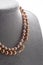 Author beautiful  pearls necklaces demonstrated on maneken. fashion and jewelry concept