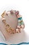 Author gold  plated bracelete with pearls and gemstones. fashion and jewelry concept