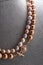 Author  pearls necklace demonstrated on maneken. close up. fashion and jewelry concept