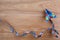 Autism awareness day or month. Paper plane in origami style with autism awareness puzzle ribbon on wooden background.