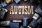 Autism Concept Wood and Rusted Metal Letters