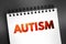 Autism - neurodevelopmental disorder characterized by difficulties with social interaction and communication, text concept on