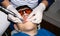 Autistic boy in dental treatment. brace. health care