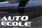 Auto ecole text in french means driving school sign write on education learning car side door