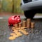 Auto finance Coins, piggy bank, and car model depict insurance