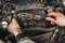 Auto mechanic changes the timing belt in the car