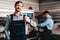 Auto Mechanic Posing With Wrench. Service Station.