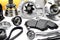 Auto parts background. Hub, pump, brake pads, filter, timing belt, rollers, constant velocity joints, thermostat and other on