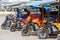 Auto rickshaw, three wheels motorcycle taxi on the street in Myanmar. This transport is cheap and popular in Burma.