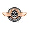 Auto service. Tires change. Emblem with racer skull and wings. Design element for logo, label, emblem, sign, badge.