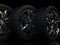 auto wheels on a dark background with chrome rims close-up