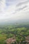 Autogyro flying over the tropical landscape