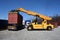 Autoloader container handling vehicle