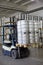 Autoloader loading beer kegs in warehouse brewery Ochakovo