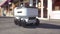 Automated Delivery Robot with Self Driving Technology. Autonomous delivery robot drives along the street. Future