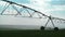 Automated Farming Irrigation Sprinklers System in Operation on Cultivated Agricultural Field