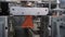 Automatic blow molding machine: manufacturing of empty orange plastic jerrycans