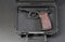 Automatic gun pistol on dark background