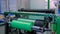 Automatic plastic bag making machine - roller with green polyethylene film
