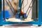 Automatic three-dimensional 3d printer performs product creation. 3d printing and automatic robotic technology, close-up