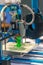 Automatic three-dimensional 3d printer performs product creation. 3d printing and automatic robotic technology, close-up