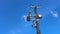 Automatic weather station, with a weather monitoring system and video cameras for observation. Against the background of blue sky