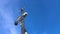 Automatic weather station, with a weather monitoring system and video cameras for observation. Against the background of blue sky