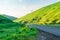 Automobile asphalt road in the picturesque green mountains of the Caucasus
