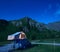 Automobile with camping tent in mountains.