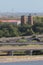 Automobile, railway and ancient Roman bridges on suburb of city. Porto-Torres, Italy