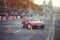 Automobile slalom and drift competitions in the city center, car on the road with cones