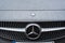 Automotive: Close up of the grille / badge on a Mercedes sports car. 1