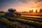 autonomous agricultural machinery tilling fields at sunset