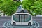 Autonomous electric shuttle bus self driving across city green road, Smart vehicle concept